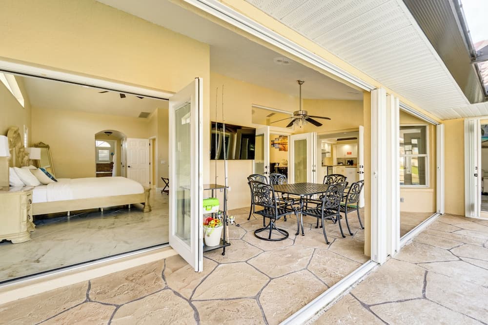 Luxe Waterfront Oasis w/ Dock, Heated Pool & Spa!