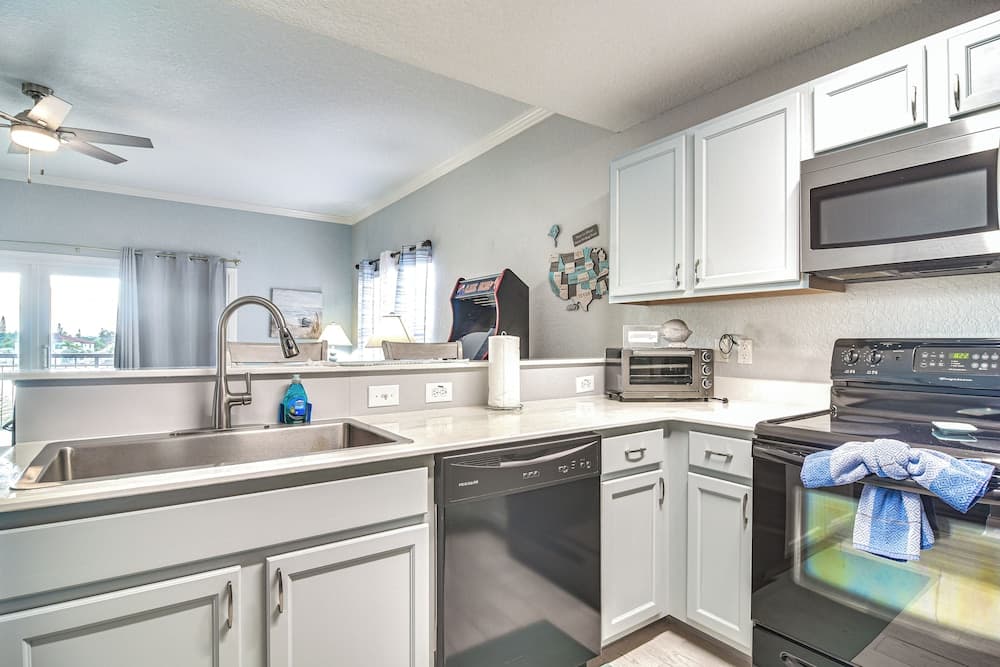 Waterfront Condo w/ Arcade in Treasure Island!