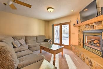 Cozy Riverfront Home w/ Fire Pit in Houghton Lake!