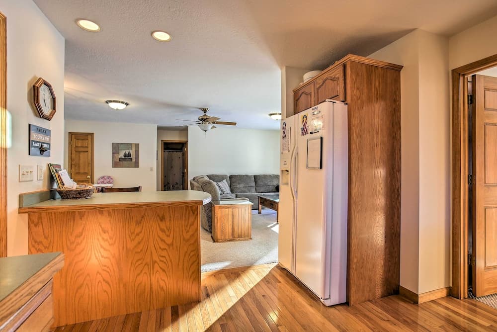 Cozy Riverfront Home w/ Fire Pit in Houghton Lake!