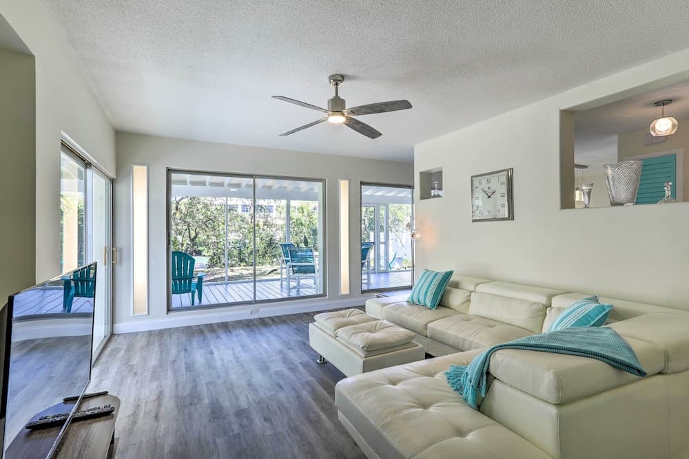 Tropical Waterfront Home: Central Location!