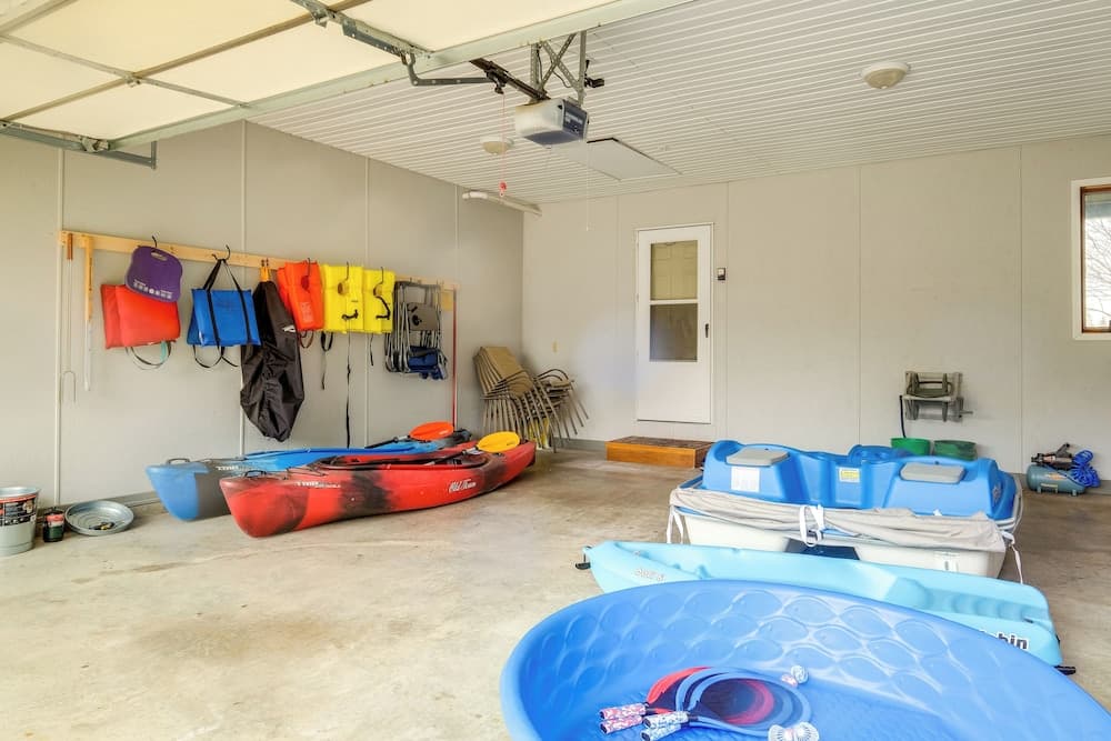 Cadillac Vacation Rental w/ Dock on Lake Mitchell!