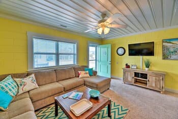 Colorful Cottage w/ Patio Across From the Beach!