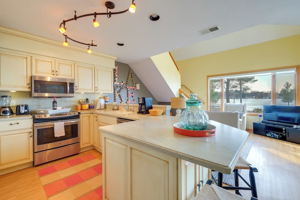 Elk Rapids Condo w/ Balcony Overlooking Elk Lake!