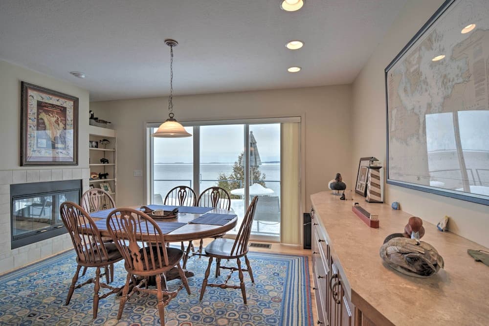 Lakefront De Tour Village Home w/ Deck & Fire Pit!