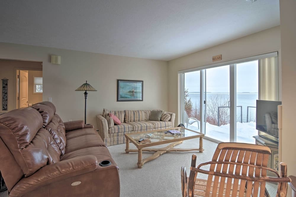 Lakefront De Tour Village Home w/ Deck & Fire Pit!