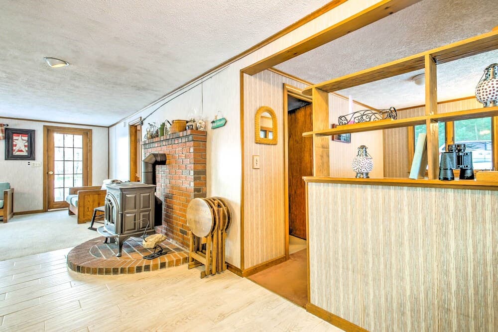 Scenic Lyman Home on Swan Pond w/ Wraparound Deck!