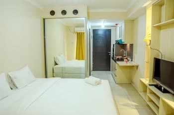Modern Studio Grand Serpong Apartment By Travelio