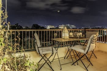 Amalia's Serendipity - City Lights & Mountain Vistas