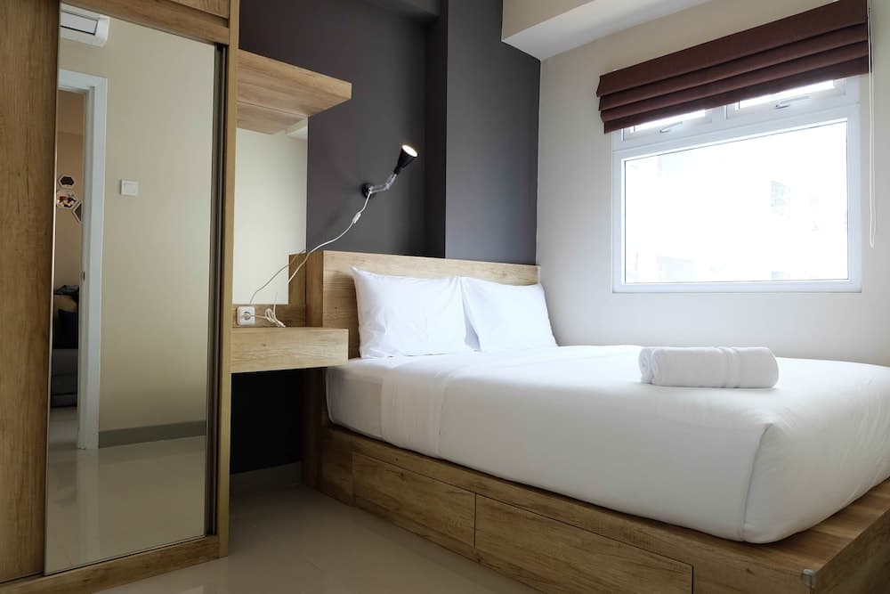 Modern and Bright 2BR Green Pramuka Apartment