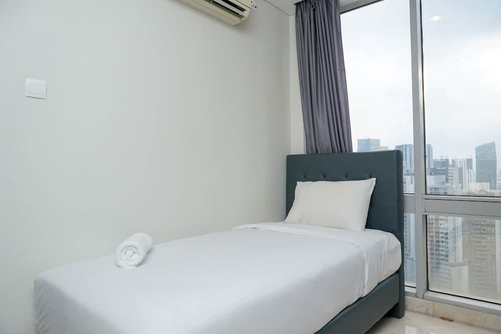 Relaxing 2BR at The Empyreal Condominium Epicentrum Apartment By Travelio