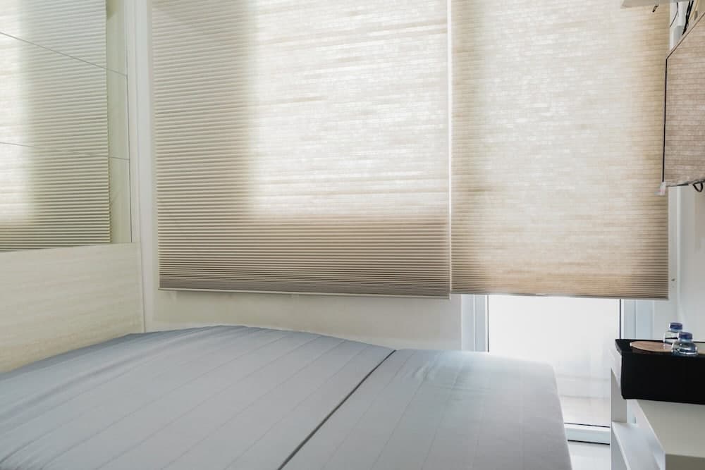 2BR Apartment with Sofa Bed at Green Pramuka City