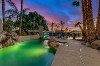 Stunning Waterfront Paradise! Sleeps 16! Heated Pool/spa and Lots of Fun! by Redawning