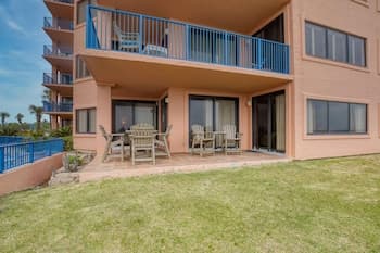 Stunning Ground Floor Condo With Lush Lawn Overlooking White Sands