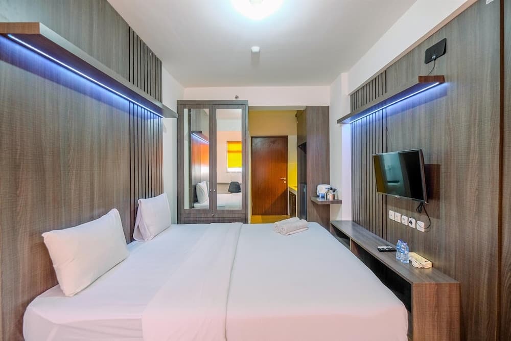Minimalist And Homey Studio At Gunung Putri Square Apartment