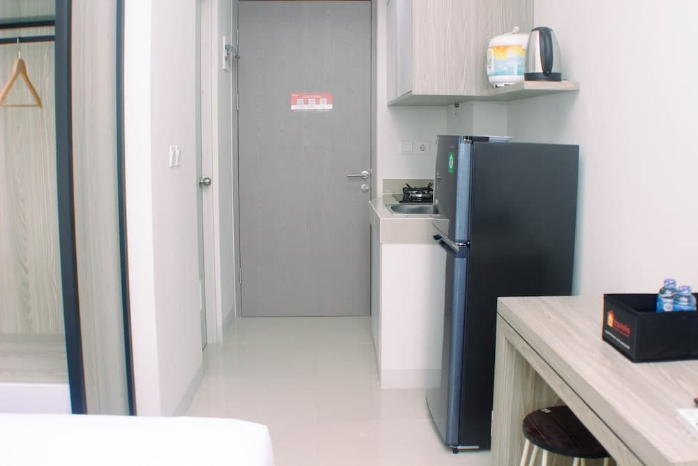 Homey And Minimalist Studio At Vasanta Innopark Apartment