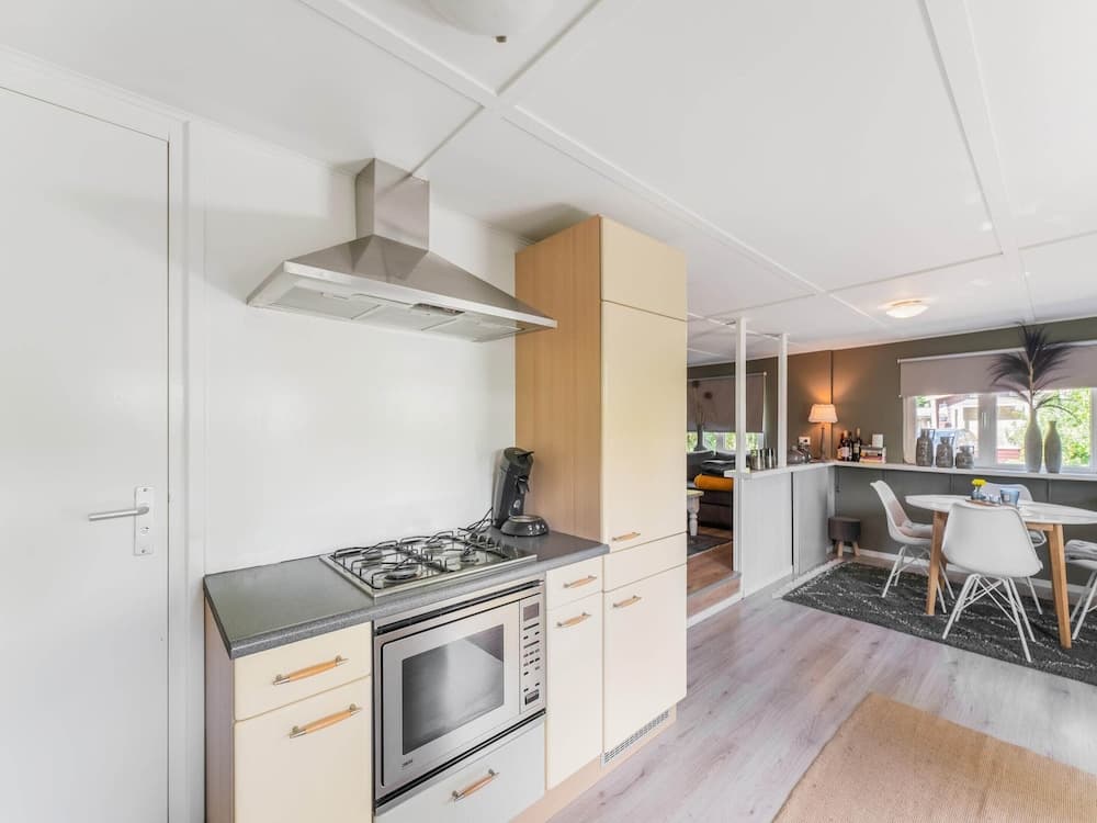 Lovely Wooden Chalet With Garden in Reutum