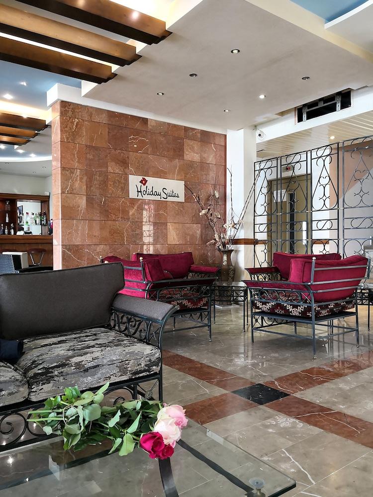 Holiday Suites Hotel And Beach