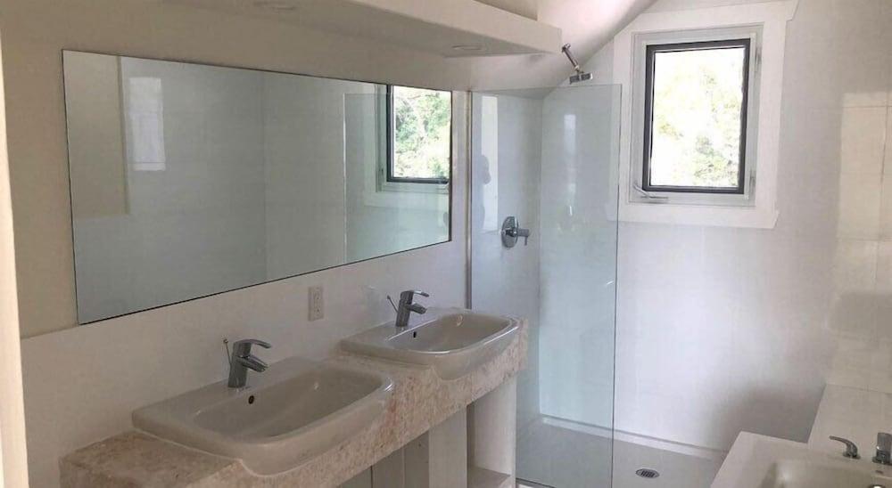 Oceanfront Haven: Elegant Estate With Private Deck