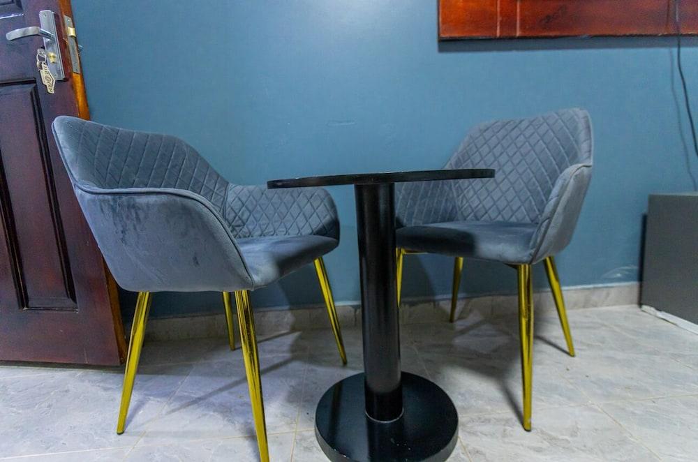 The Den Soroti White