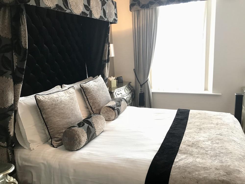 Ennios Boutique Hotel Rooms