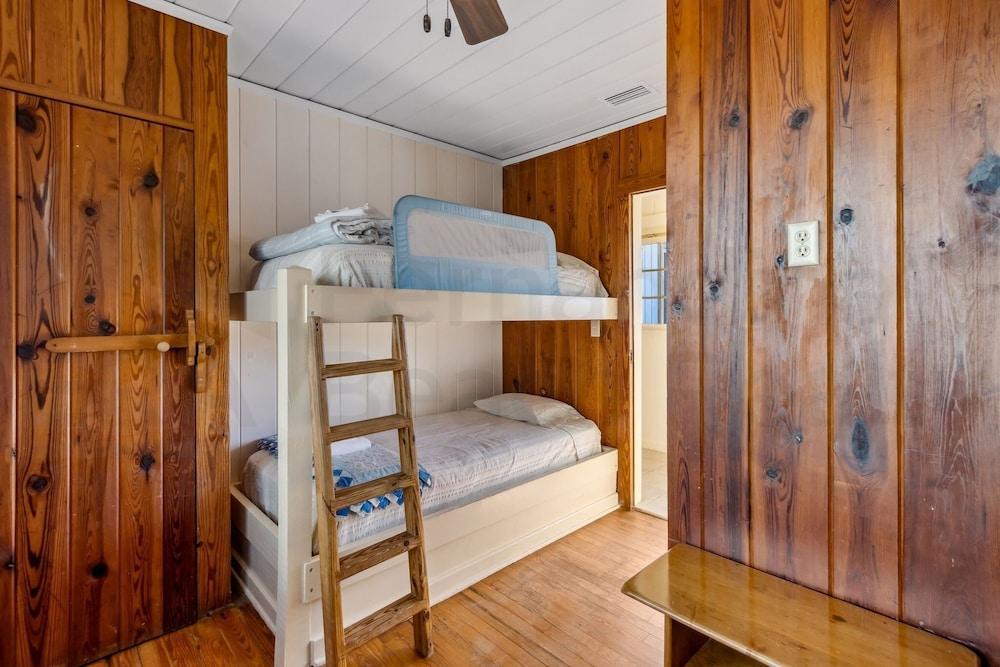 Charming Oceanfront Beach House by RedAwning