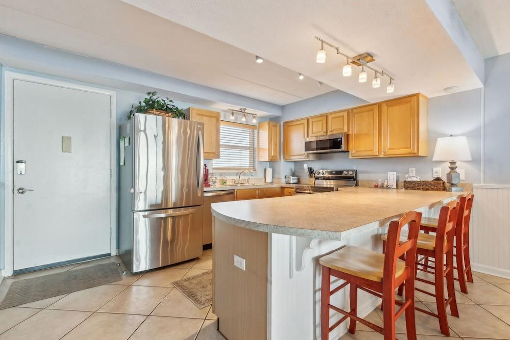 Direct Oceanfront Condo with Private Balcony by RedAwning