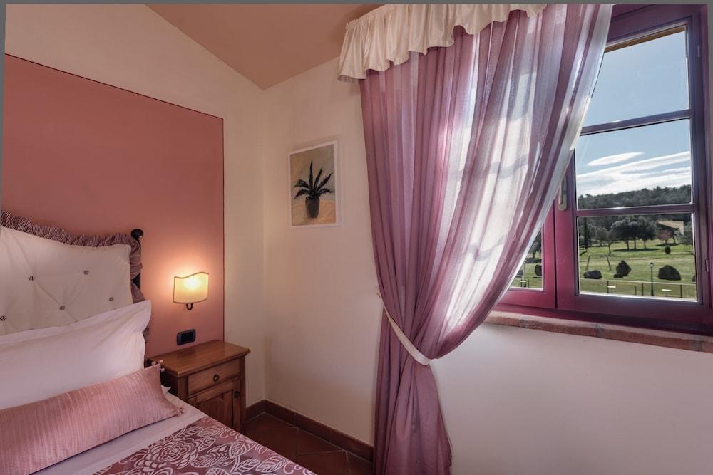 Hotel Casolare Le Terre Rosse