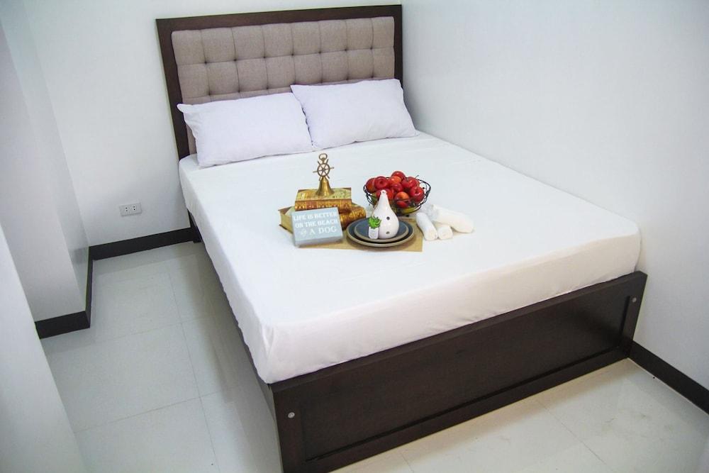 V and G Suites Limay