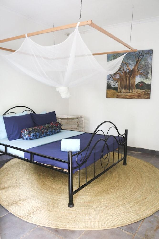 Worlds Collide Africa House