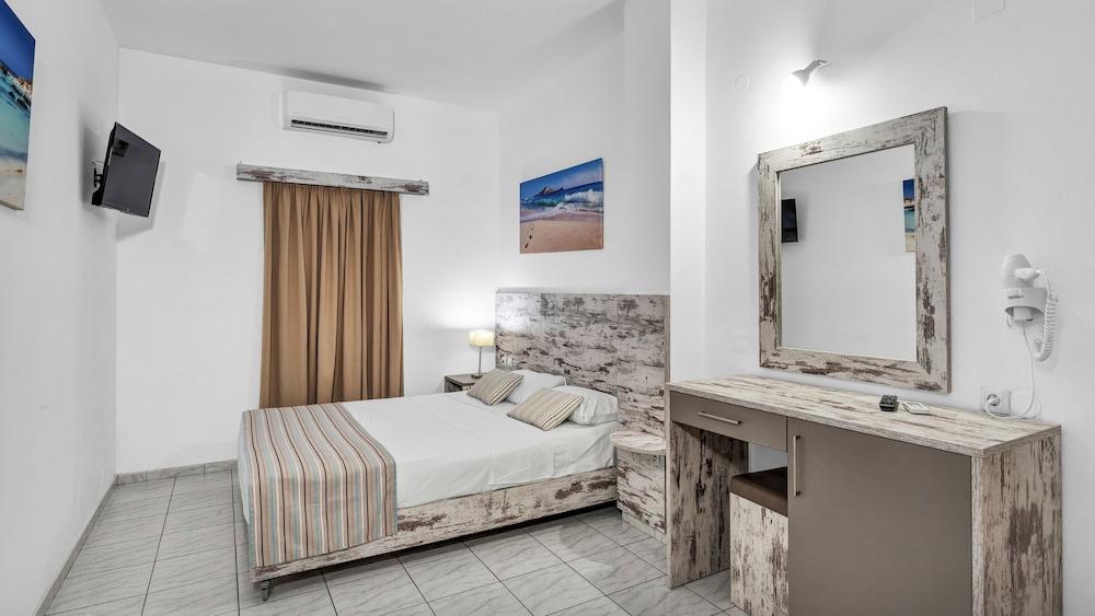 Evina Rooms & Suites