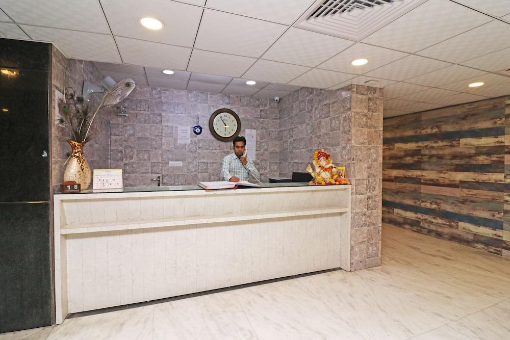 OYO 26911 Kcg Hotels