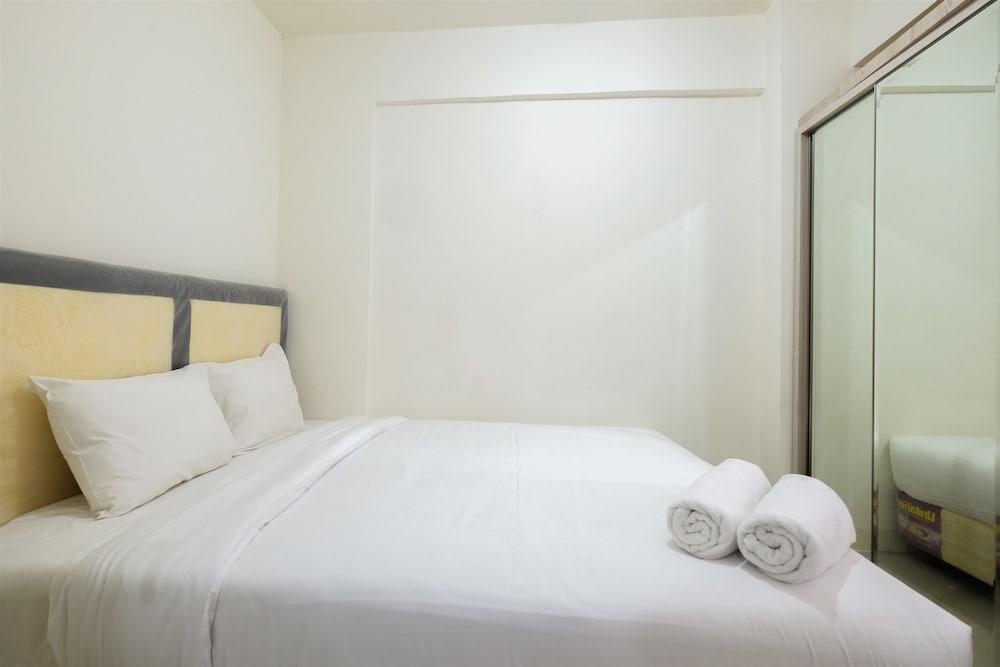 Comfortable 2BR Green Pramuka Apartment