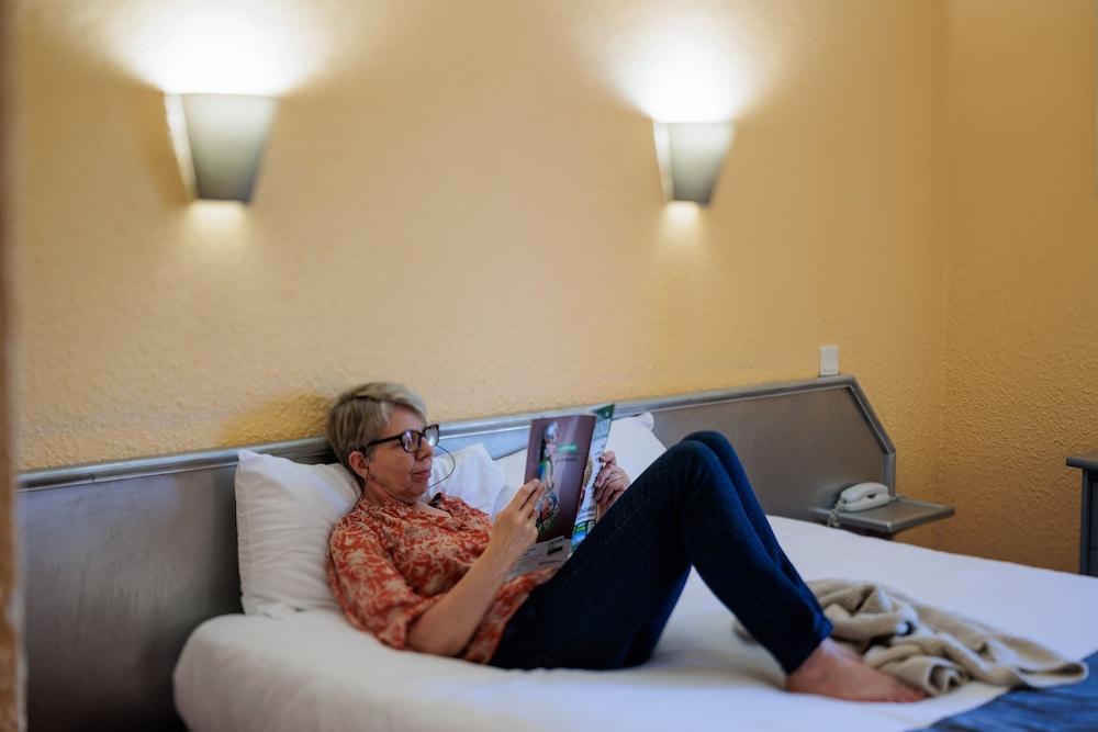 Logis Hôtel Noemys Brive - Restaurant Le Teinchurier