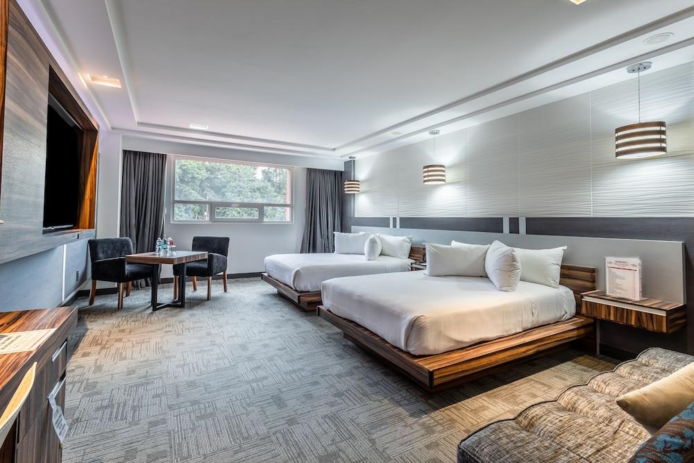 Suites Inn La Muralla Metepec