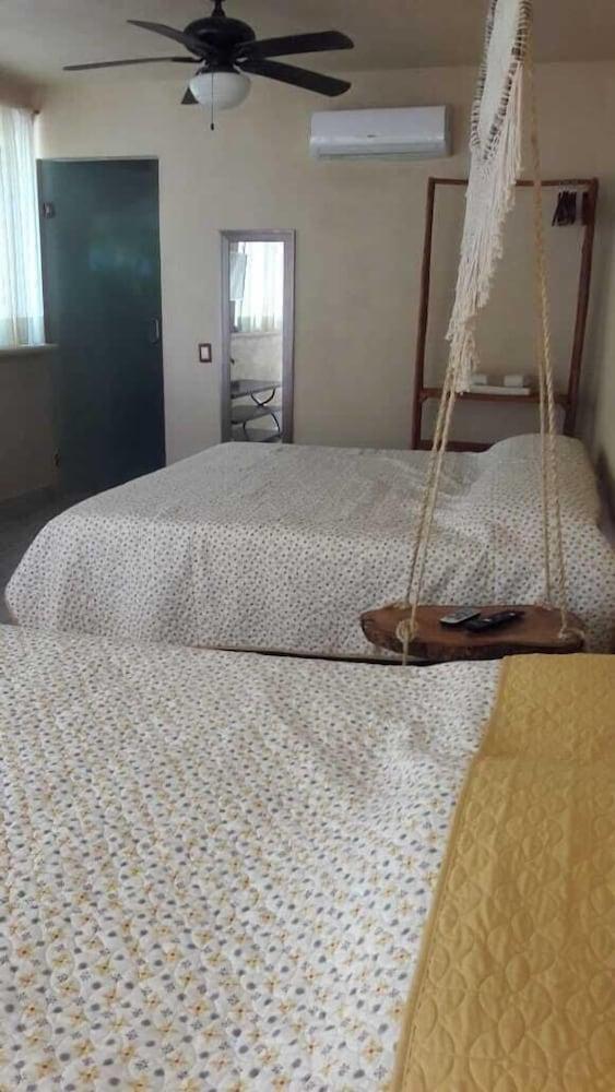 Iguana Rana Cabins Bacalar