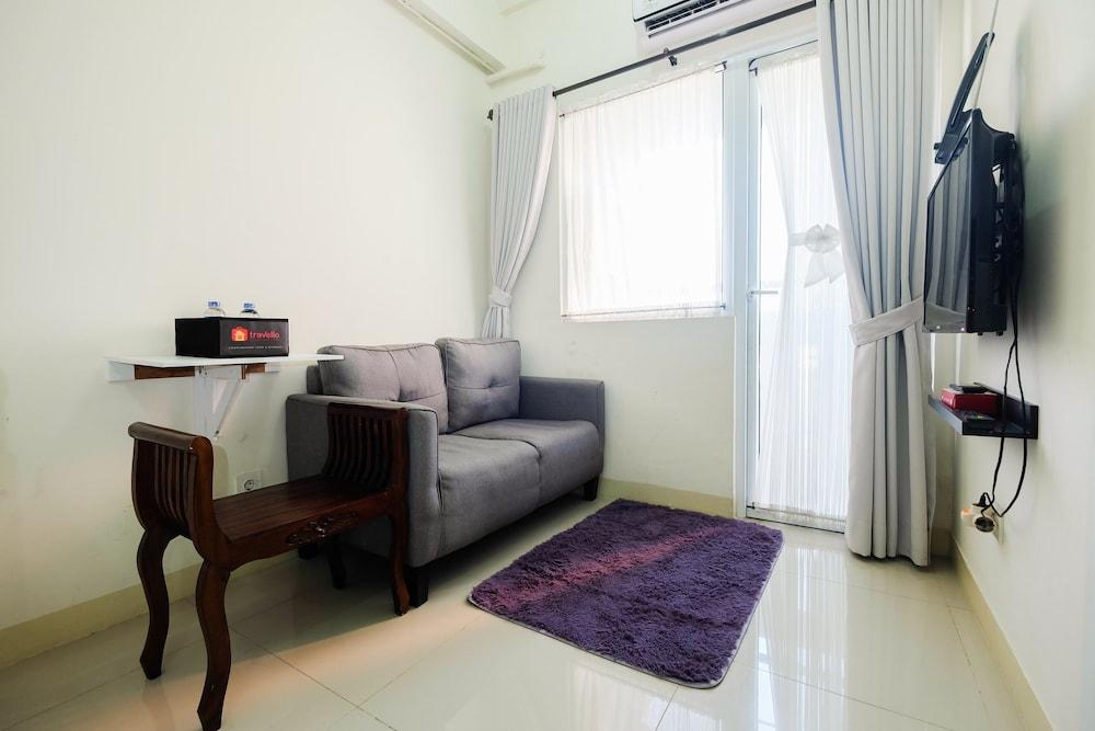 Tranquil 2BR @ Green Pramuka Apartment