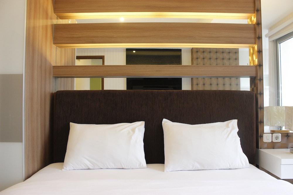 Homey 2BR Apartment at Sudirman Suite