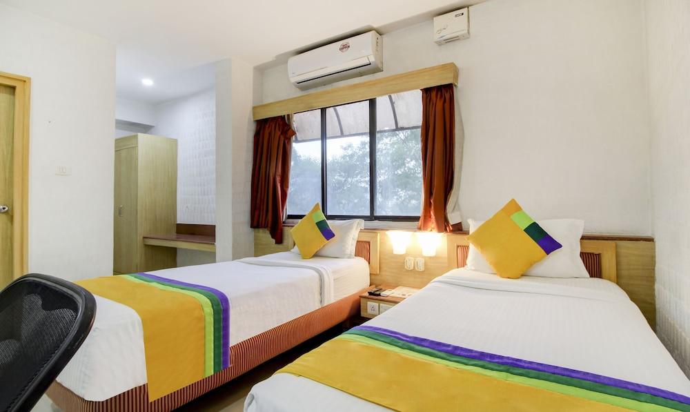 Treebo Trip AND Suits