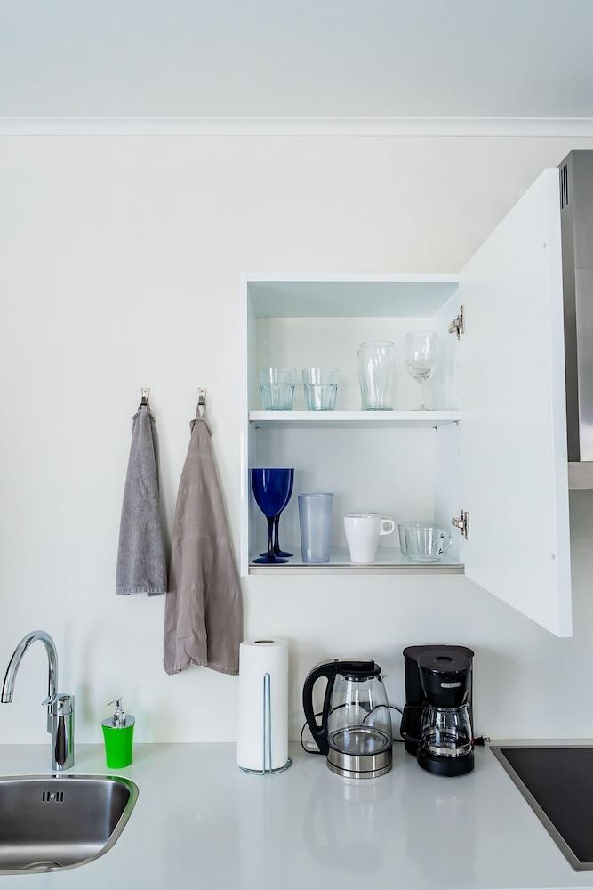 The Palm Leaf Apartments