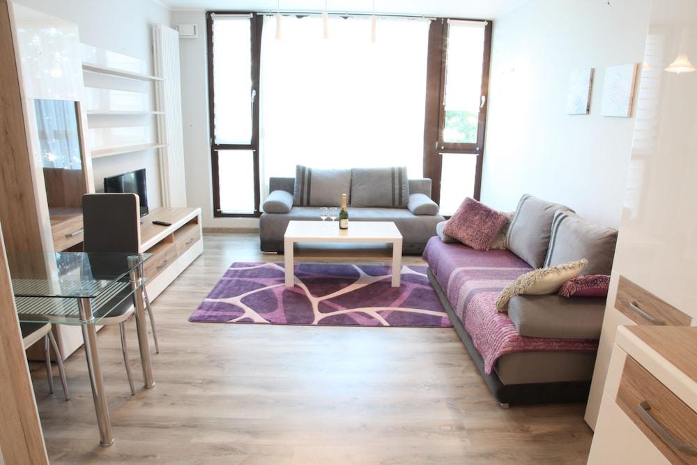 Violet Triton Apartment