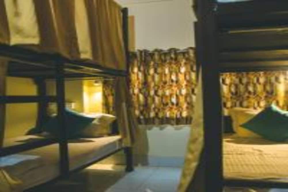 On The Ghat by Howdy Hostels