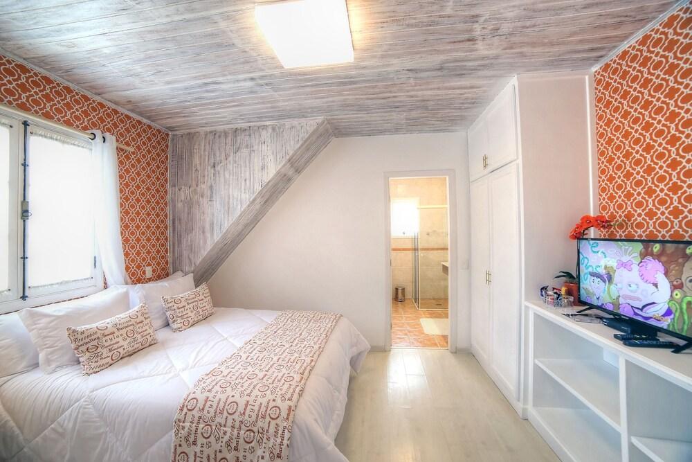 Vila de Charme Suítes