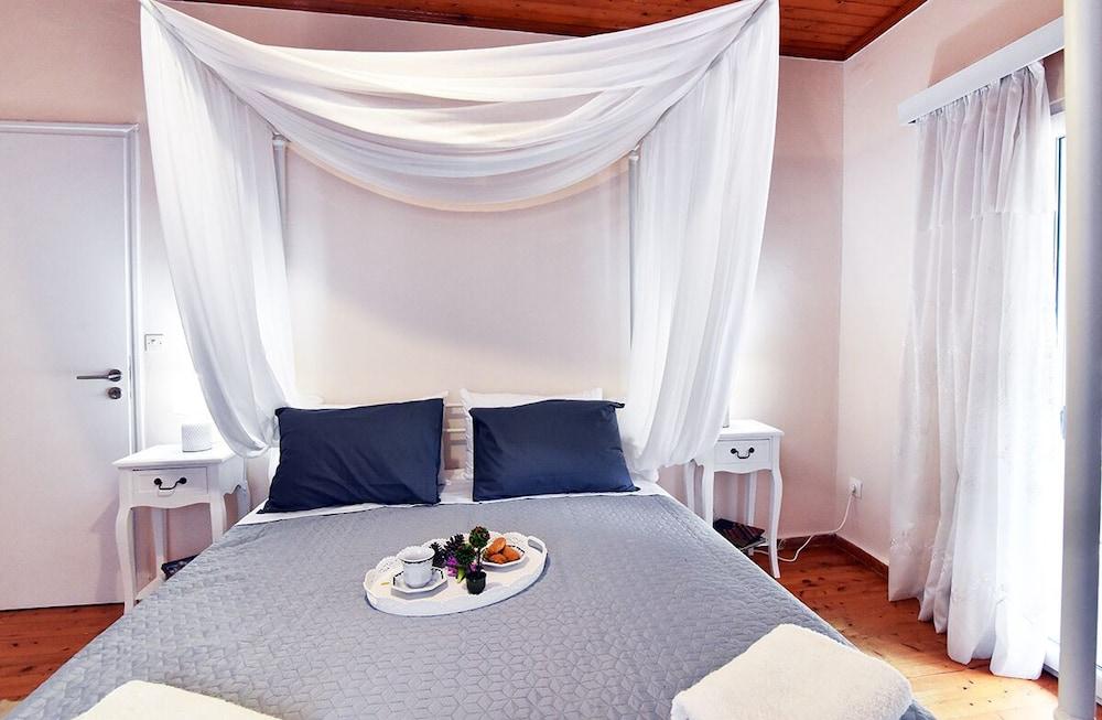 Karmela's Cottage  by CorfuEscapes