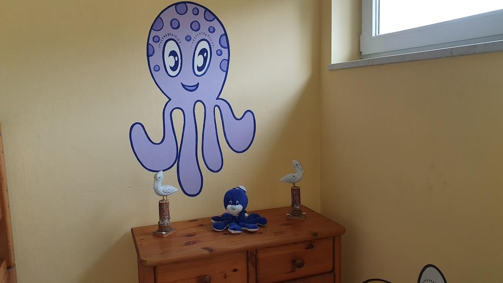 Ferienwohnung Tintenfisch