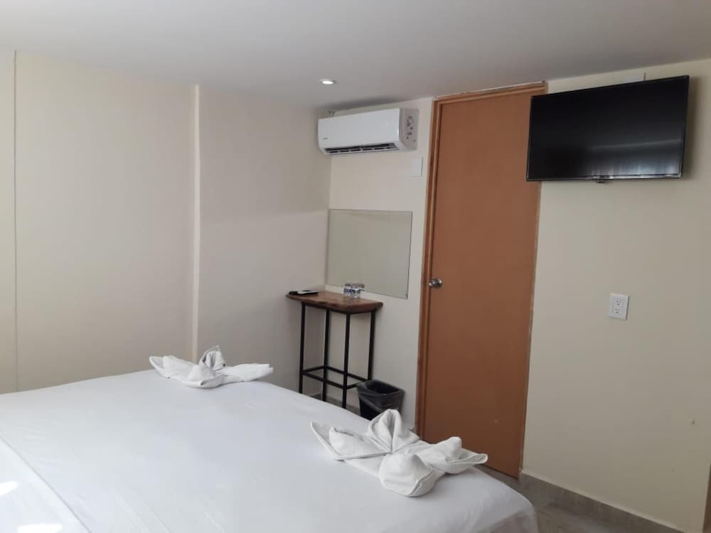 Hotel Ashly Loma Larga