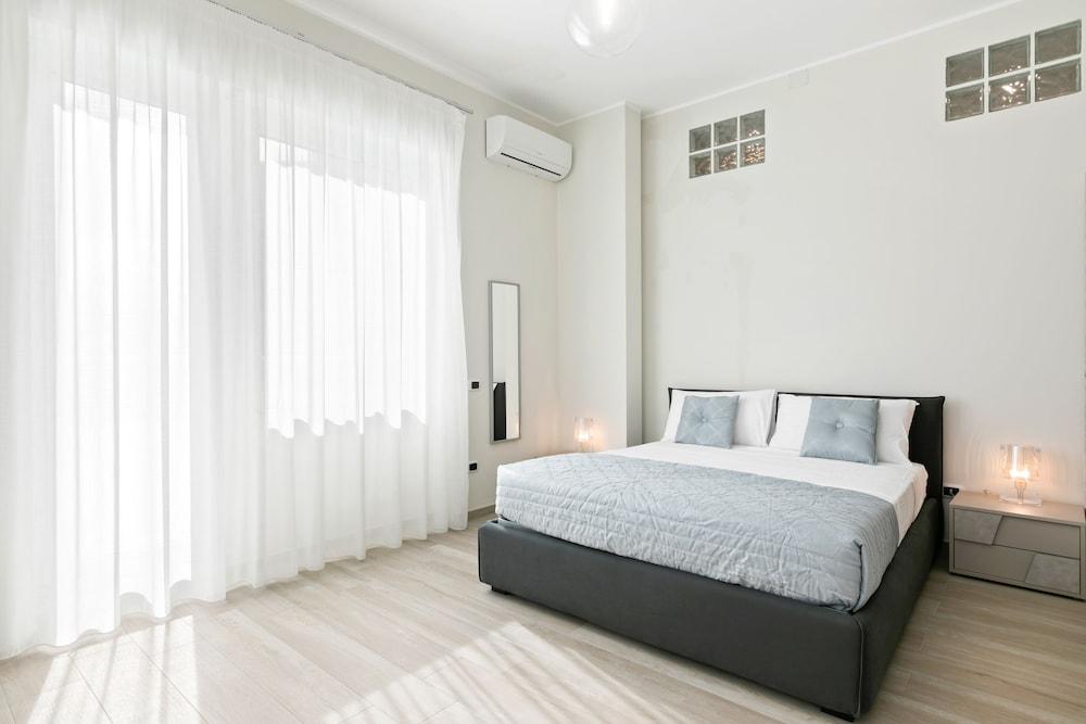 Grattacielo Ina Apartments