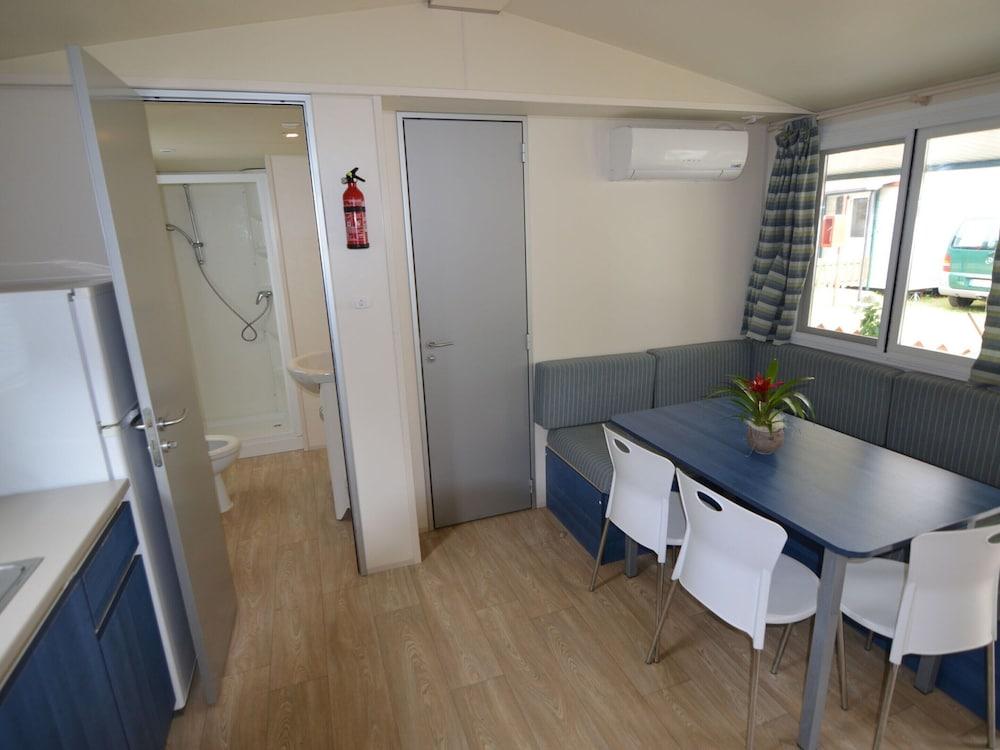 Nice Chalet with Terrace near Sea