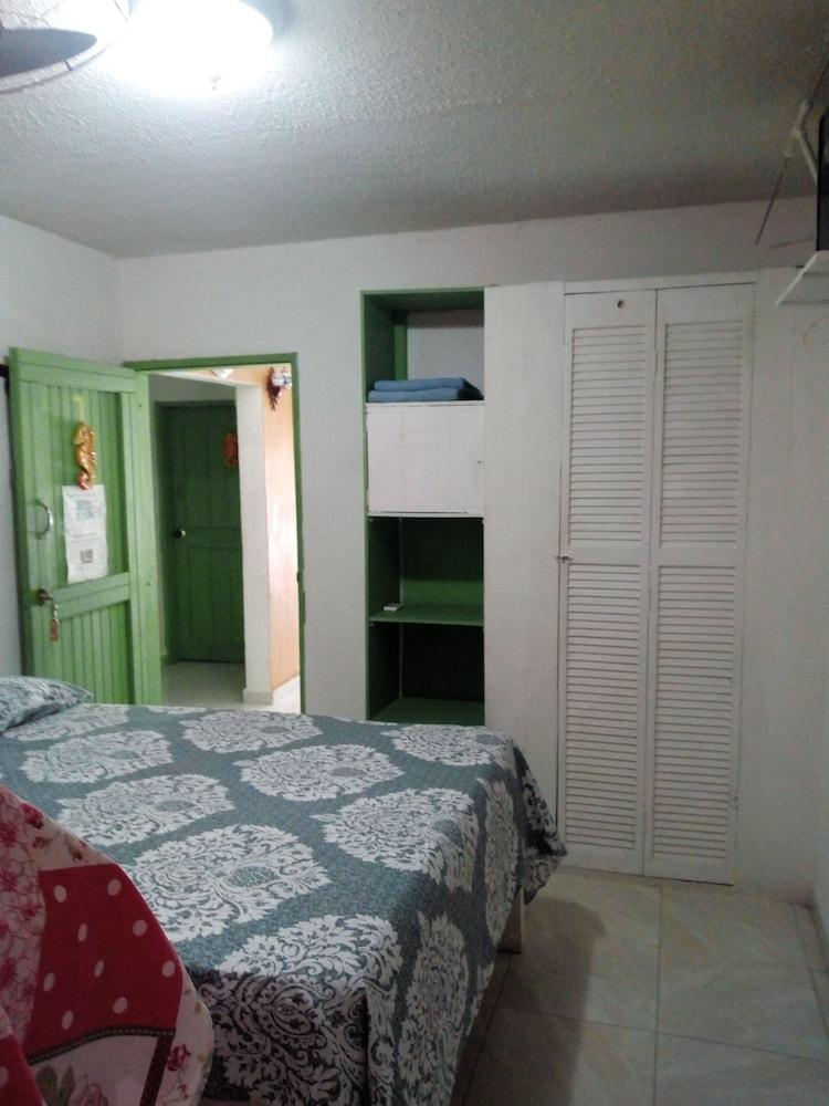 Room in Guest Room - Green Sea Inn in the San Luis Sector