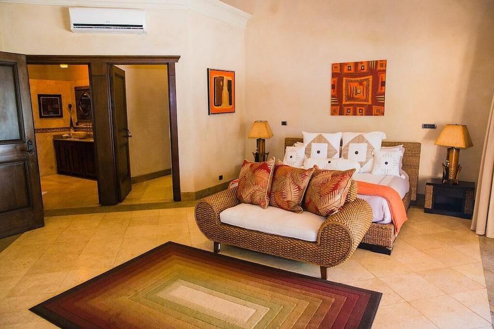 Luxurious Beachfront Mansion with a Stunning Infinity Pool in Playa Flamingo